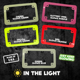 Variety of glow in the dark license plate frames from Just Keep Glowing, showcasing different colors and glow effects.  Highlighting US manufacturing and unique style for cars and motorcycles.