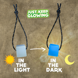 Rechargeable glow in the dark cube transitioning from light blue in light to a bright blue glow in the dark, demonstrating charging and illumination. Just Keep Glowing. Ideal for camping, emergencies, and everyday use.